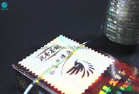 El efecto de impresión ULTRAVIOLETA compensado del laser de la cinta de la tira de rasgón del cigarrillo de BOPP modifica el logotipo para requisitos particulares