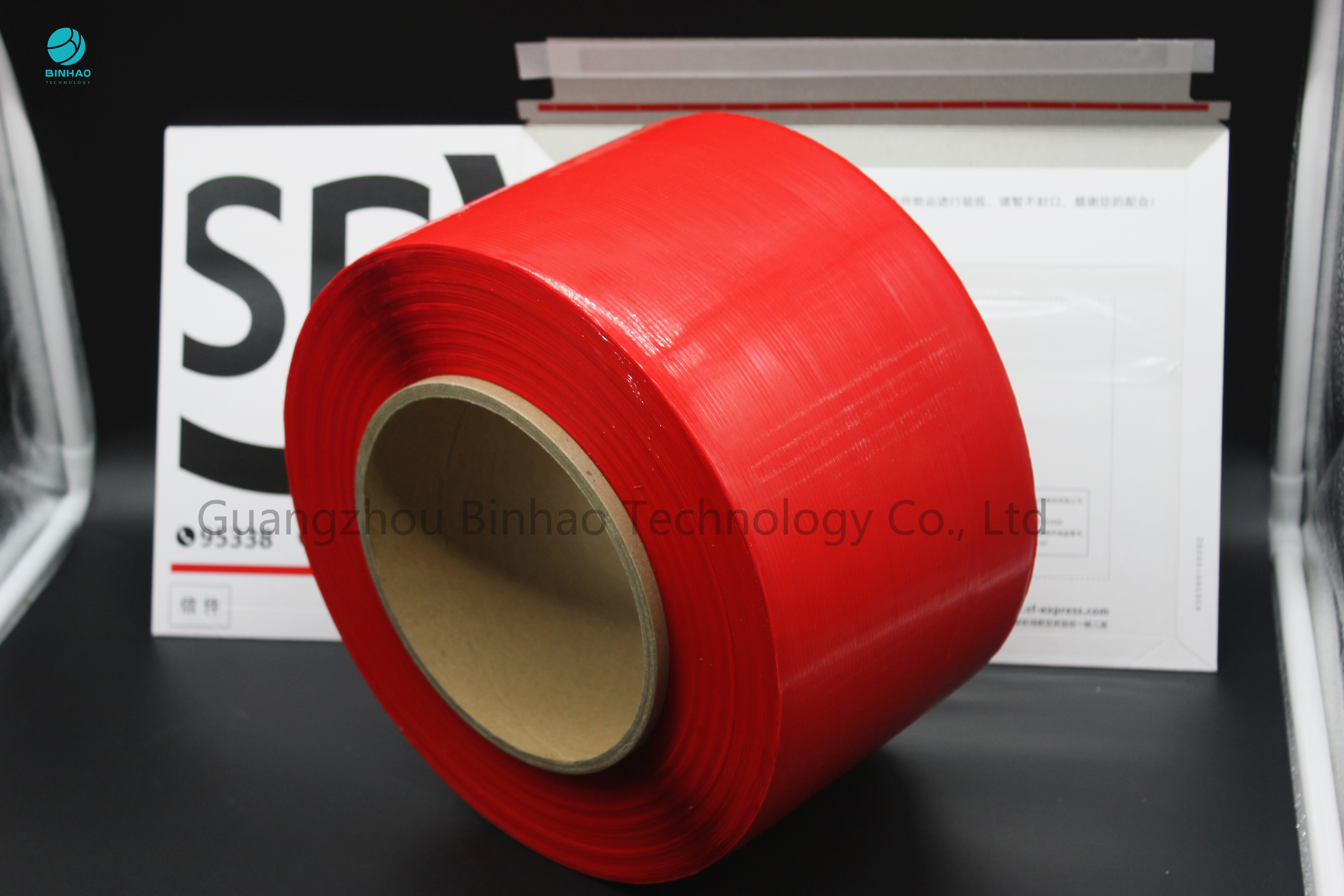 La cinta de la tira de rasgón del paquete/rojos expresos rasga lejos la cinta respetuosa del medio ambiente